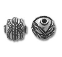 Two ornate silver round metal beads