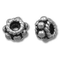 Two silver round spacer beads with raised dots