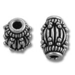Ornate silver filigree barrel beads
