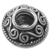 Ornate silver bead with swirl filigree