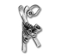 Silver letter K charm with skier figure