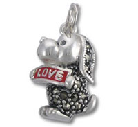 Silver puppy charm holding red LOVE banner