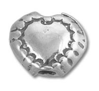 Silver heart-shaped charm bead with scalloped edge