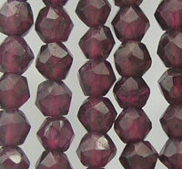 Strands of faceted dark red beads