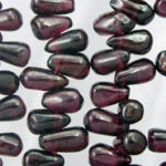 Close-up of dark purple teardrop beads
