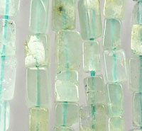 Translucent aqua glass beads arranged vertically