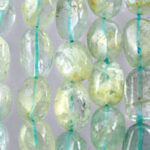 Close-up of translucent pale green glass beads
