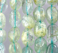 Close-up of translucent pale green glass beads
