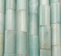 Pale green cylindrical beads in vertical rows