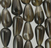 Translucent gray teardrop bead strands