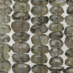 Strands of faceted smoky gray beads