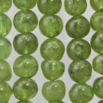 Close-up of green round gemstone beads