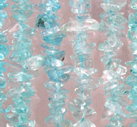 Aquamarine chip bead strands on pink