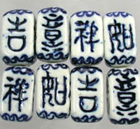 White porcelain mahjong tiles with blue characters