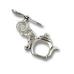 Tea Pot and Spoon Silver