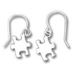 Pair of silver puzzle-piece dangle earrings