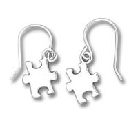 Pair of silver puzzle-piece dangle earrings