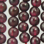 Close-up of dark red garnet beads