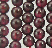 Close-up of dark red garnet beads