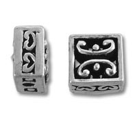 Rectangular silver beads with black enamel scrolls