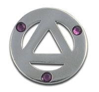 Silver circular medallion with triangle and purple gems