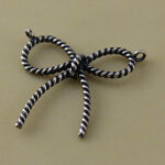 Oxidized Medium Bow Link Charm
