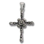 Ornate silver cross pendant with tiny beads