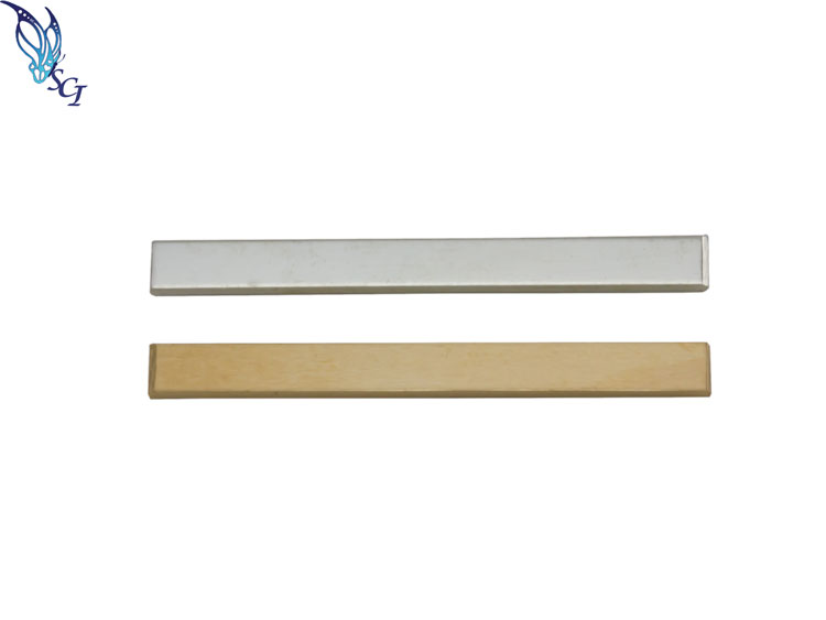 Silver and gold rectangular metal bars Silver and gold rectangular metal bars