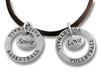 Pair of silver stamped round pendant necklaces